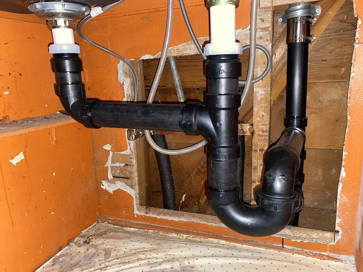 Professional Garbage Disposal Repair equipment and tools on the job in Mascoutah